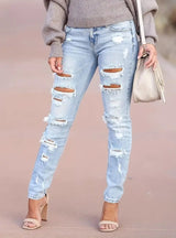 Women Washed Hole Pencil Jeans