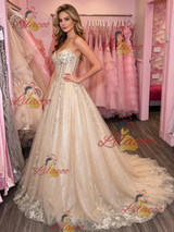 Cahmapgne Tulle Appliques Strapless Prom Dress