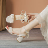 Thick-heeled Pearl Bow Sandals