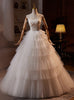 White Tulle Spaghetti Straps Tiers Beading Wedding Dress