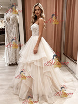 Champagne Tulle Strapless Appliques Wedding Dress