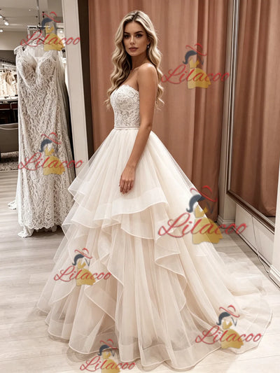 Champagne Tulle Strapless Appliques Wedding Dress