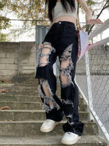 Black High-waisted Holes Raw Edges Jeans
