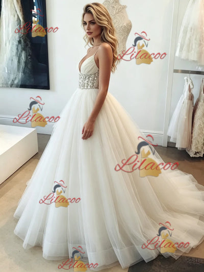 White Tulle Spaghetti Straps Beading Wedding Dress