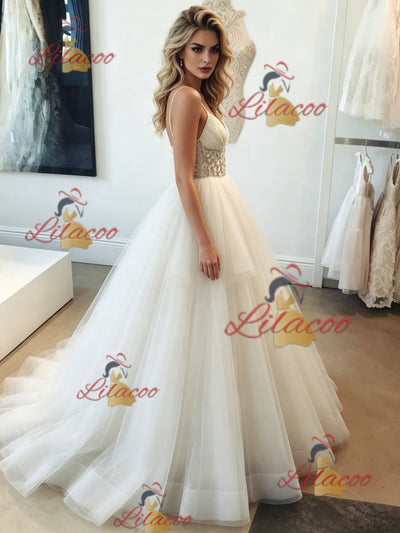 White Tulle Spaghetti Straps Beading Wedding Dress