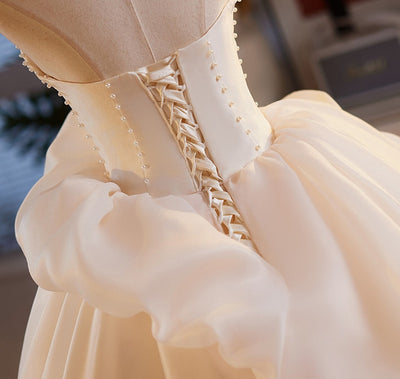 Champagne Tulle Strapless Flower Bow Wedding Dress