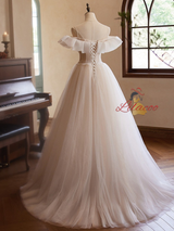 Champagne Tulle Lace Spaghetti Straps Beading Wedding Dress