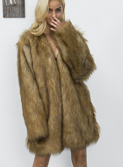 A Woman With a Long V Neck Coat In Imitation Fur