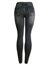 Punched Elastic Slimming Jeans Pants